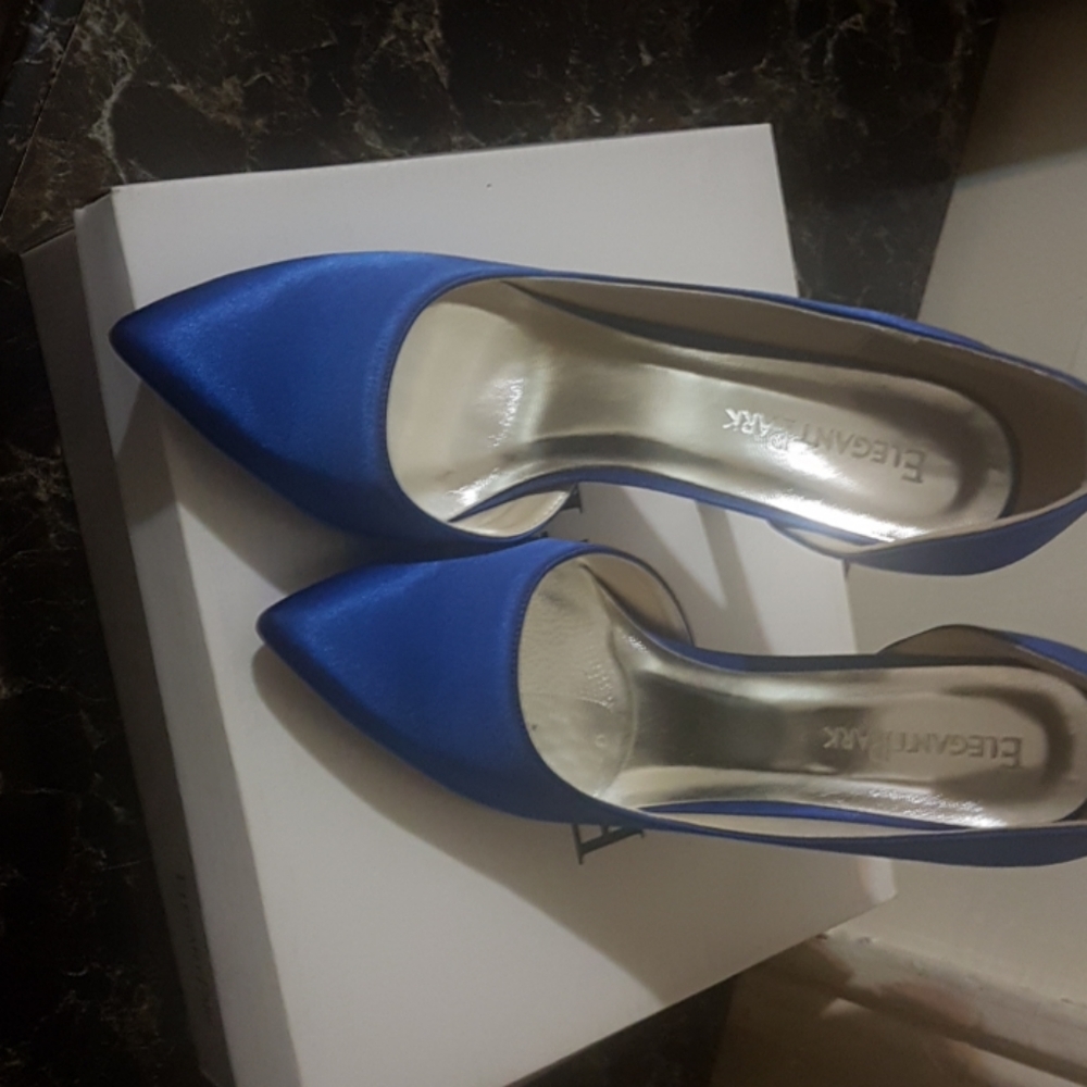 Elegant park  brand new plum heels  .